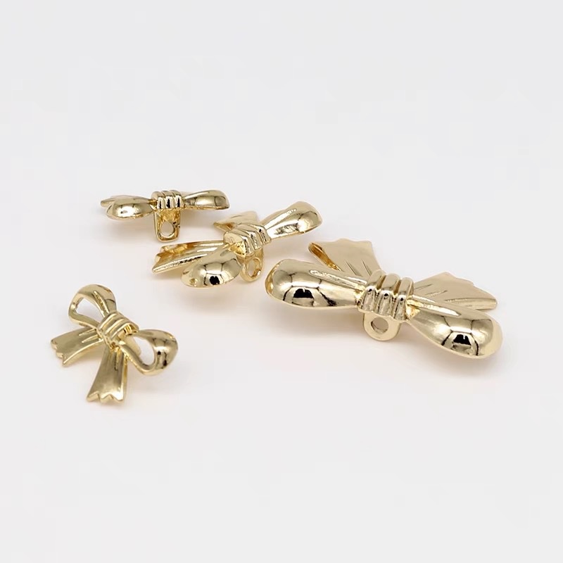 กระดุมโลหะ รูปโบว์น่ารัก 10 ชิ้น สําหรับตกแต่งเสื้อแจ็กเก็ต ผู้หญิง - รูปที่ 2