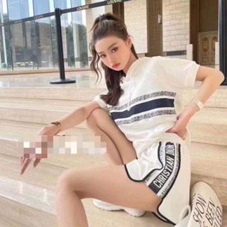 Trendy short-sleeved hooded blouse, leisure sports, wide-legged shorts, two-piece set of new fashionable suits in early autumn