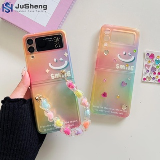 Jusheng เคสโทรศัพท์มือถือแฟชั่น ลายหน้ายิ้ม หน้ายิ้ม แต่งเลเซอร์ และโซ่ สําหรับ Samsung Z Flip4 Z Flip3