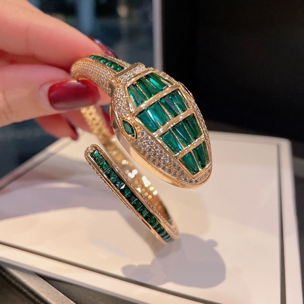 ผู้หญิงระดับไฮเอนด์หรูหราเต็มเพชรไขลานงูสร้อยข้อมือนาฬิกา