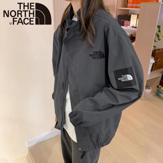 Thenorthface เสื้อแจ็กเก็ตกันลม ปักลายโลโก้ ของแท้ 100% สไตล์เรโทร สําหรับเดินป่า กลางแจ้ง ทุกเพศ