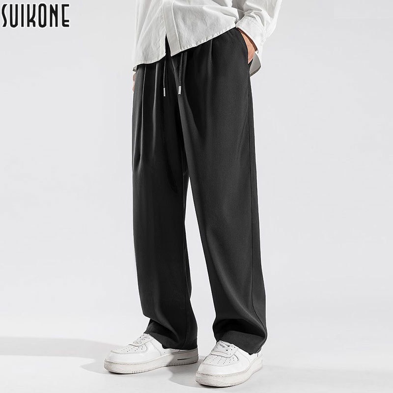 Suikone กางเกงขายาวผู้ชายแฟชั่นสีทึบเรียบง่ายสบาย ๆ กางเกงกีฬาผ้าไหมน้ำแข็งสามารถสวมใส่ได้ทั้งชายและหญิง