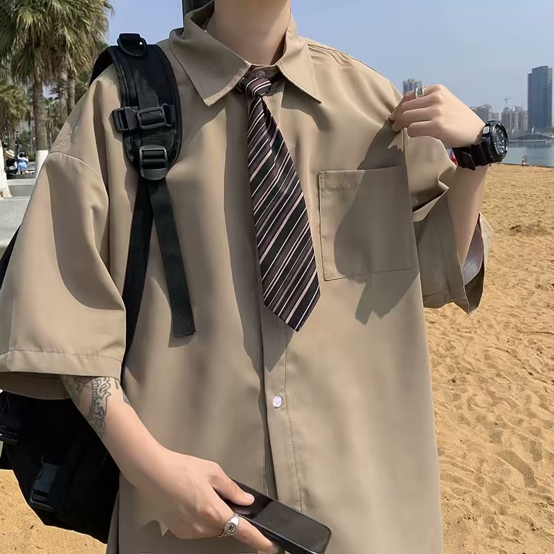 เสื้อเชิ้ตแขนสั้นลําลอง ทรงหลวม สไตล์กระโหลก สําหรับผู้ชาย