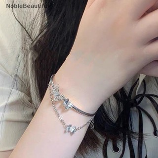 [NobleBeautiful] สร้อยข้อมือโซ่ สองชั้น จี้ผีเสื้อ ประดับพู่ ปรับได้ แวววาว เข้ากับทุกชุด เครื่องประดับ สําหรับผู้หญิง