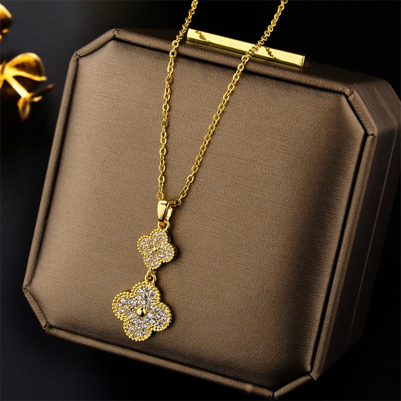 Ht สร้อยคอสเตนเลส ไทเทเนียม ชุบทองแท้ 18K จี้ใบโคลเวอร์สี่แฉก ประดับเพชร ไม่จางหาย แฟชั่นสไตล์เกาหลี สําหรับผู้หญิง