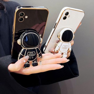 เคสโทรศัพท์ซิลิโคน กันกระแทก ลายนักบินอวกาศ พร้อมขาตั้ง สําหรับ Samsung A04