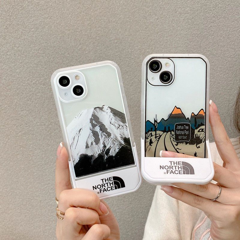 Thenorthface เคสโทรศัพท์มือถือ ซิลิโคนนิ่ม ใส กันกระแทก ลายแมวกวักปีใหม่ Cinnamoroll Stitch Family พร้อมขาตั้ง สําหรับ iPhone 14 11 13 12 Pro Max plus