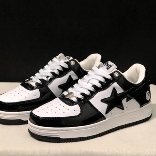 รองเท้าผ้าใบลําลอง รุ่น Bape Sta Ape-Man Head Low-Cut สีดํา และสีขาว แฟชั่นสําหรับผู้ชาย และผู้หญิง