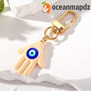 Oceanmapdz พวงกุญแจ โลหะผสม รูปตาปีศาจ หยดน้ํามันปาล์ม น่ารัก สําหรับรถยนต์