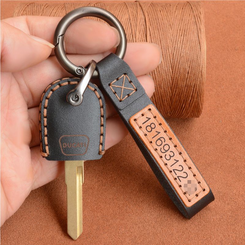 เหมาะสําหรับ DUCATI DUCATI V2V4 ฝาครอบกุญแจ 696 748 749 996 999 848 Street Fighter 959 กระเป๋าหัวเข็