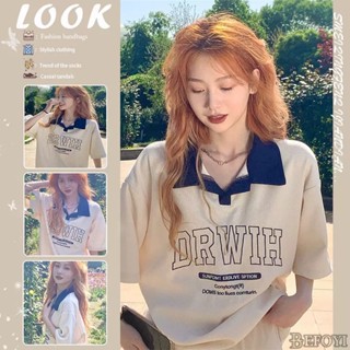 เสื้อโปโลแขนสั้นลําลอง ผ้าฝ้าย 100% พิมพ์ลายตัวอักษร สีกากี สไตล์เกาหลี สําหรับผู้ชาย และผู้หญิง zyq096