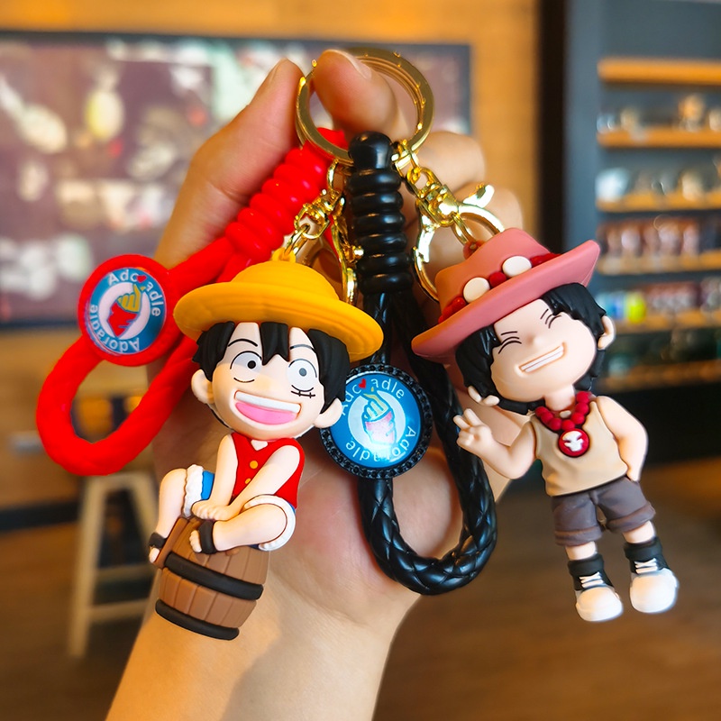 พวงกุญแจ จี้ตุ๊กตา PVC รูปการ์ตูนลูฟี่ โซโร่ช็อปเปอร์ ลูฟี่ แฟชั่นคู่รัก สําหรับตกแต่งรถยนต์ จํานวนหนึ่งชิ้น