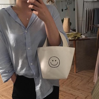 กระเป๋าถือ ผ้าแคนวาส ขนาดเล็ก ลายหน้ายิ้มน่ารัก เป็นมิตรกับสิ่งแวดล้อม สไตล์เกาหลี สําหรับแม่ และลูก 2023