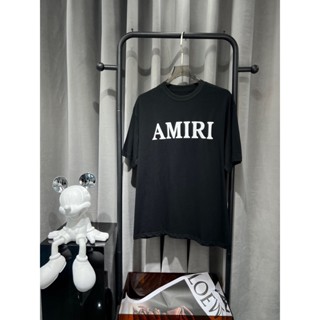 Amiri เสื้อยืดลําลอง แขนสั้น คอกลม พิมพ์ลายโมโนแกรม ทรงหลวม สไตล์ยุโรป และอเมริกา แฟชั่นสําหรับผู้ชาย และผู้หญิง