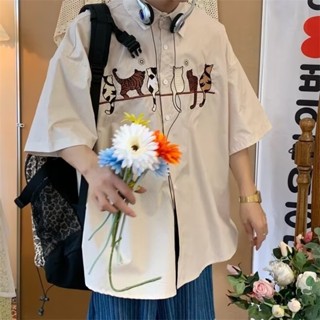 เสื้อเชิ้ตแขนสั้น คอปก ปักลายการ์ตูนแมว ทรงหลวม สไตล์เกาหลี เรโทร แฟชั่นฤดูร้อน สําหรับผู้ชาย 2023