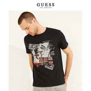 Guess เสื้อยืดคอกลม แขนสั้น พิมพ์ลายกราฟฟิติ แนวสตรีท แฟชั่นฤดูใบไม้ผลิ สําหรับผู้ชาย M2YI02K9RM1