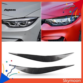 Skym* ฝาครอบไฟหน้ารถยนต์ คาร์บอนไฟเบอร์ ขนาดเล็ก ทนทาน สีดํา สําหรับ BMW F80 M3 F82 F83 M4 F32 F33 F36 4 Series 2 ชิ้น