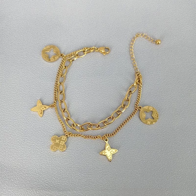 สร้อยข้อมือ ชุบทอง 18K จี้ใบโคลเวอร์สี่แฉก สองชั้น นําโชค แฟชั่นสําหรับผู้หญิง ของขวัญ