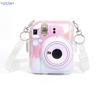 Utzn&gt; ใหม่ เคสกล้อง แบบใส พกพา พร้อมสายคล้องไหล่ สําหรับ Fujifilm Instax Mini 12 1 ชิ้น