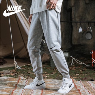 Nike ของแท้ 100% กางเกงกีฬาลําลอง แถบสะท้อนแสง ใส่สบาย แนวสตรีท แฟชั่นสําหรับผู้ชาย