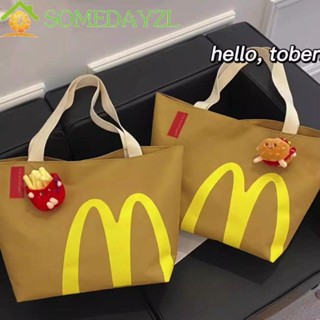 Somedayzl McDonalds กระเป๋าถือ กระเป๋าสะพายไหล่ ผ้าแคนวาส ทรงโท้ท ขนาดใหญ่ จุของได้เยอะ แต่งหัวเข็มขัดแม่เหล็ก ลายตัวอักษร สไตล์ฝรั่งเศส สําหรับผู้ชาย