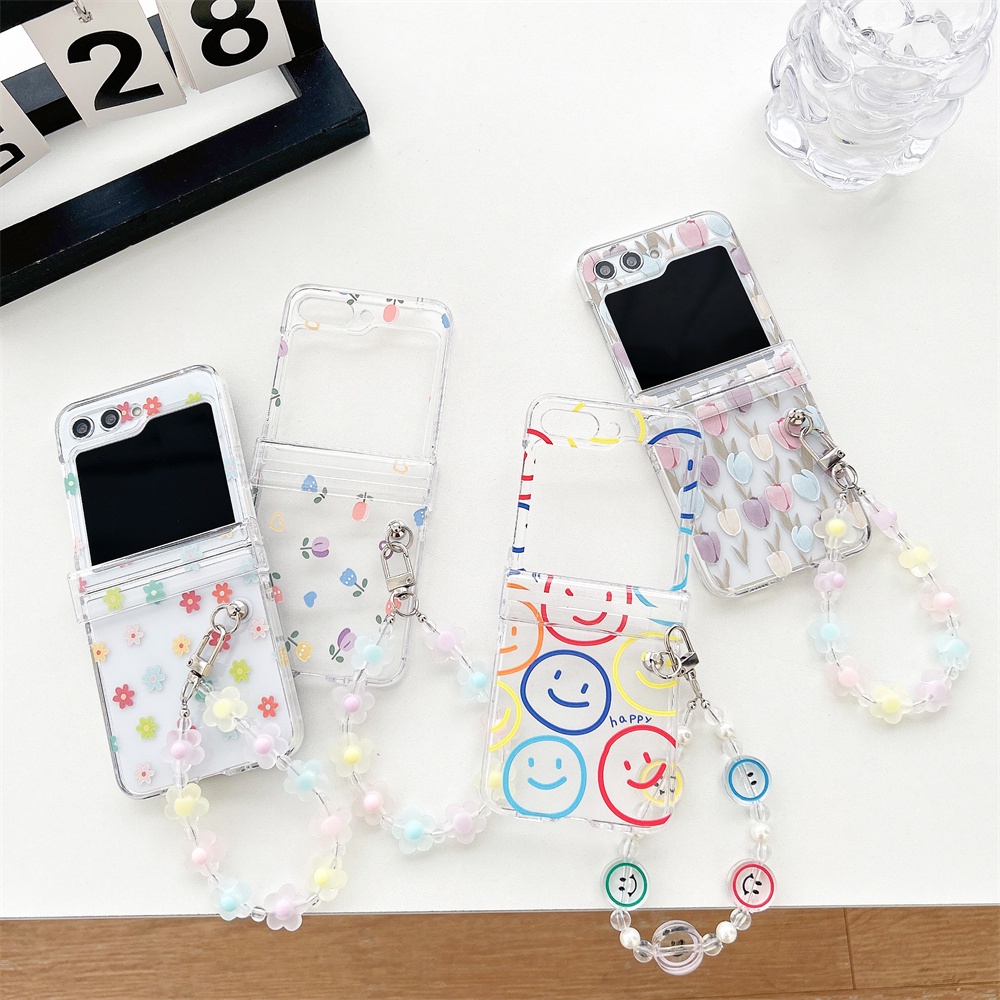 เคสโทรศัพท์มือถือ PC แข็ง กันกระแทก ลายดอกไม้ ดอกทิวลิป หน้ายิ้ม พับได้ พร้อมสร้อยข้อมือ สําหรับ Samsung Z Flip 5 ZFlip5
