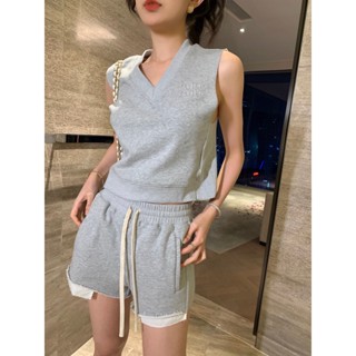 FOUR MIU MIU 2023 spring and summer new V-neck thread stitching embroidered letter decorative design top elastic waist shorts suit for women