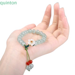 Quinton สร้อยข้อมือหยก บุคลิกภาพ ปรับได้ กําไลมรกต พู่ สร้อยข้อมือโบราณ ทอมือ เชือก ผู้หญิง กําไลข้อมือ