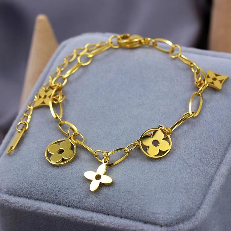สร้อยข้อมือเหล็กไทเทเนียม Lucky Four-Leaf Clover สไตล์หรูหรา สำหรับผู้หญิง