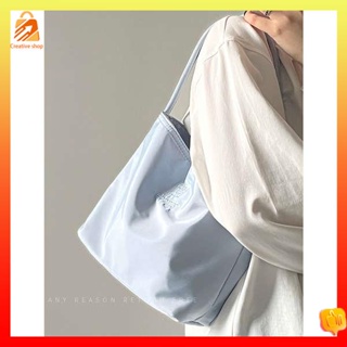 กระเป๋าผ้า กระเป๋าผ้าแคนวาสใบใหญ่ กระเป๋า Chen Mujia ผู้หญิง2023ใหม่แฟชั่นเย็บปักถักร้อยผ้าใบกันน้ำไนลอนแมทช์ง่ายสบายๆใต้วงแขนกระเป๋าสะพาย