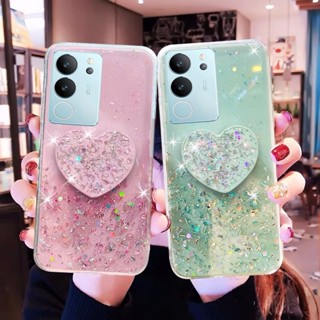 ใหม่ พร้อมส่ง เคสโทรศัพท์มือถือ ซิลิคอน TPU นิ่ม ใส กันกระแทก ปิดด้านหลัง แต่งเลื่อม ระยิบระยับ รูปหัวใจ พร้อมขาตั้ง พับได้ สําหรับ VIVO V29 5G X90 Pro 2023