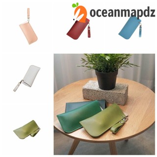 Oceanmapdz กระเป๋าแว่นกันแดด หนัง สีพื้น กันน้ํา แฟชั่น เคสป้องกันแว่นตา พร้อมพวงกุญแจ แบบพกพา เดินทาง