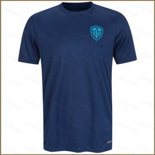 Qy 2023-2024 เสื้อยืดลําลอง แขนสั้น คอกลม พิมพ์ลาย Leeds United Jersey พลัสไซซ์ ให้ความอบอุ่น เหมาะกับการเล่นกีฬา ฟุตบอล