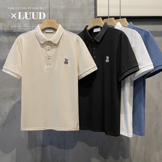 Luud เสื้อเชิ้ตโปโล แขนสั้น คอปก ปักลายหมี สร้างสรรค์ เหมาะกับฤดูร้อน เข้าได้กับทุกชุด สําหรับผู้ชาย