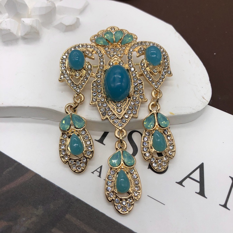 สวยหรู คริสตัล พลอยเทียม เพทาย นกยูง เข็มกลัด สําหรับผู้หญิง เข้างานเลี้ยง งานพรอม ชุดอุปกรณ์เข็มกลัดสัตว์ ยาว ขอบเข็มกลัด ผู้ชาย ชุดสูท หมุด พู่ หรูหรา เสื้อยกทรง - รูปที่ 4