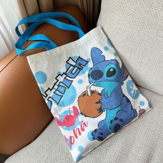 กระเป๋าสะพายไหล่ ผ้าแคนวาส ขนาดใหญ่ จุของได้เยอะ แบบพกพา ลายการ์ตูน STITCH น่ารัก สําหรับนักเรียน