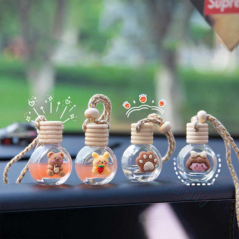 (ขวดเปล่า ) ขวดน้ำหอมเปล่าแบบแขวน ในรถยนต์ จี้น้ำหอม ขวดแก้วใสทรงสี่เหลี่ยม ฝาไม้ ขวดน้ําหอมปรับอากาศในรถยนต์ แบบแขวน ลายการ์ตูน