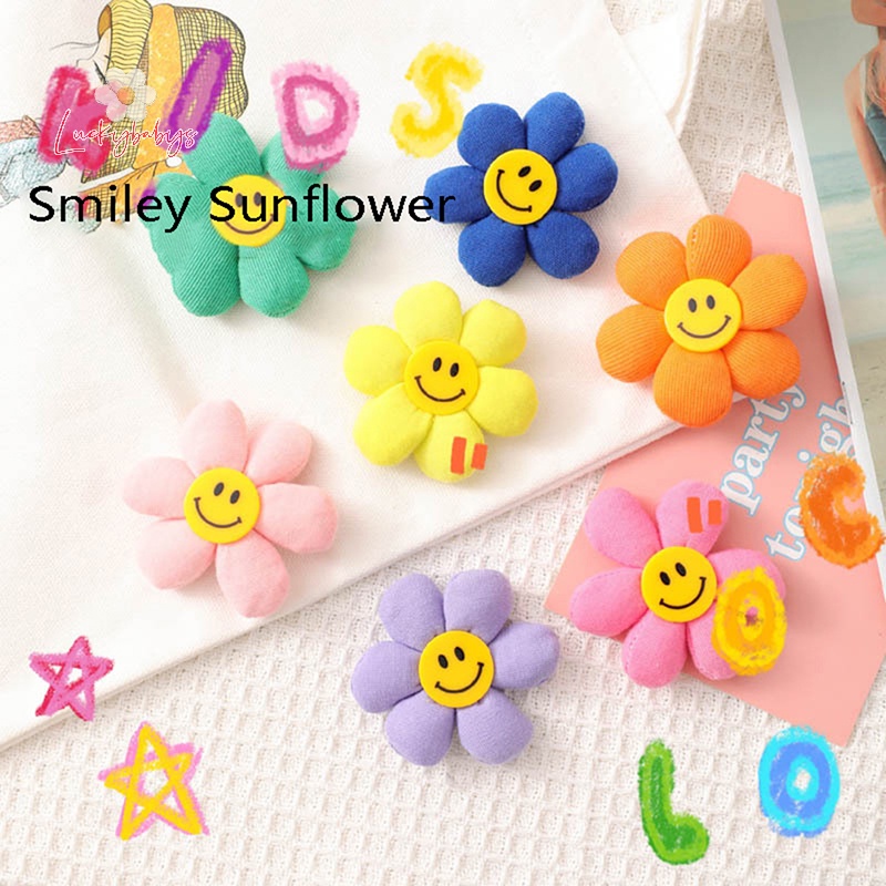 Luckybabys> 1 ชิ้น น่ารัก แฟชั่น ที่มีสีสัน หน้ายิ้ม ดอกทานตะวัน เข็มกลัด เข็มกลัด ป้าย ของขวัญ ใหม่