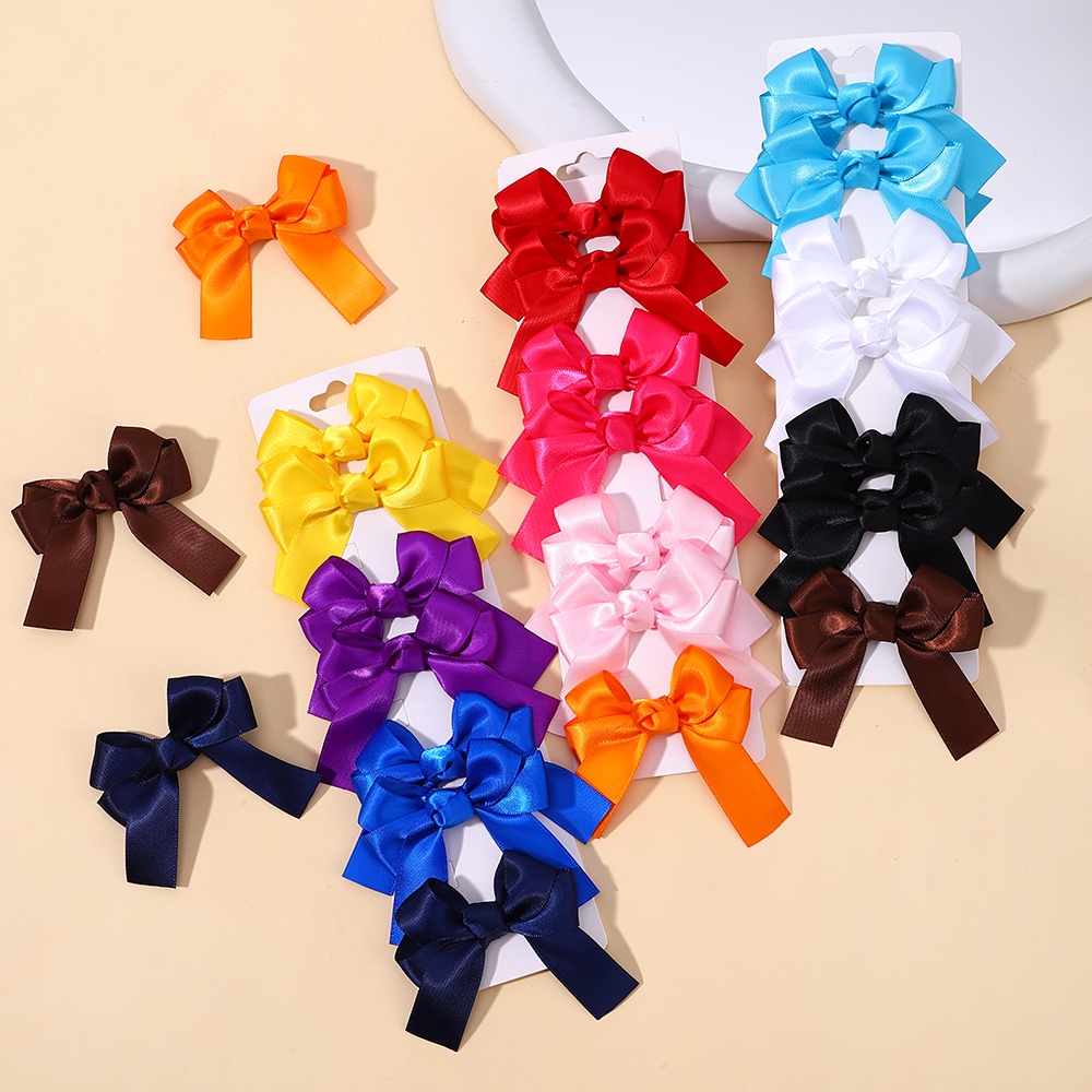 2 ชิ ้ นริบบิ ้ นสีทึบหวานโบว ์ Hairpins เด ็ ก Boutique สาวอุปกรณ ์ เสริมผมขายส ่ ง