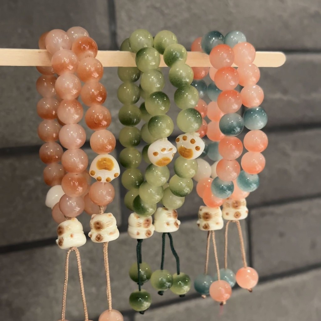 สร้อยข้อมืออุ้งเท้าแมว Little Lime Cat สีเขียว ดีไซน์ดูดีสำหรับมือถือ