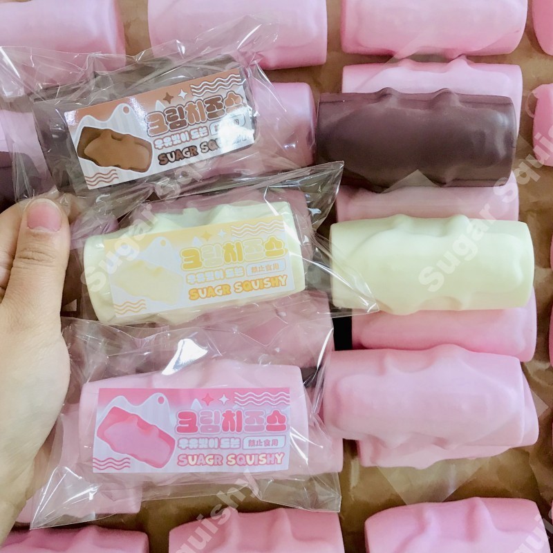 สกุชชี่น้ําตาล แท่งครีมช็อคโกแลต 3 สี สกุชชี่ที่เพิ่มขึ้นช้า