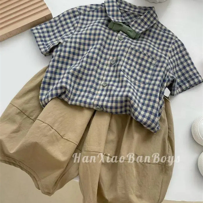 AJL สินค้าใหม่ประจำฤดูร้อนปี 2025 ชุดเด็กชายเสื้อยืดและกางเกงแขนสั้นสไตล์เกาหลี ลายสก๊อต