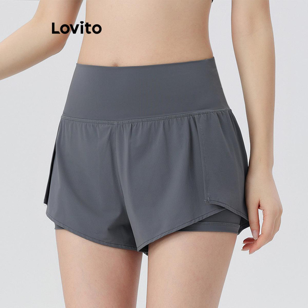 Lovito กางเกงกีฬาขาสั้นผู้หญิง เย็บหลอกสองชิ้น สีพื้น สไตล์สปอร์ต LNL68375