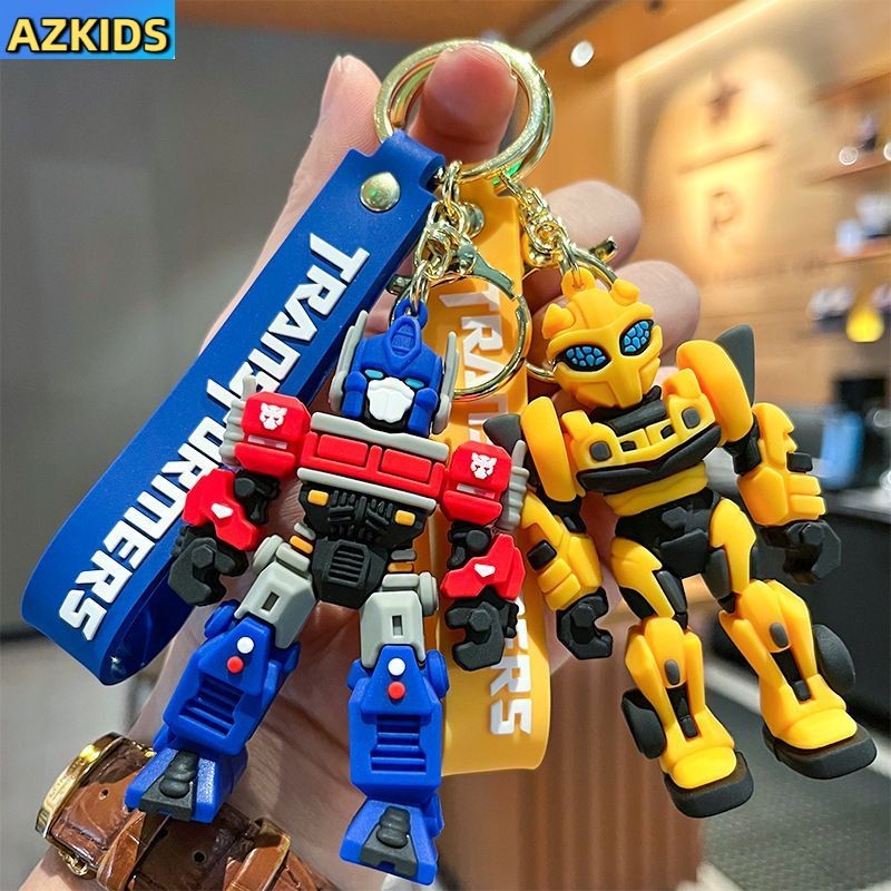 Transformers Optimus Prime Bumblebee พวงกุญแจตุ๊กตาสามมิติจี้กระเป๋านักเรียน