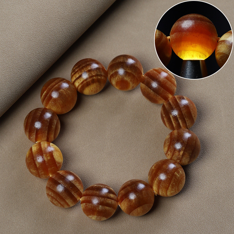 สร้อยข้อมือเลือดมังกรโปร่งแสง มรกต Pine Mingzi Amber เครื่องประดับไม้มะฮอกกานีสำหรับผู้ชาย