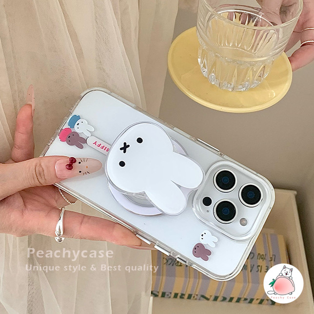 การ์ตูนน่ารัก มิฟฟี่ กระต่ายที่วางยืนชาร์จไร้สายกรณีโทรศัพท์เข้ากันได้สําหรับ ไอโฟน 16 15 14 13 มือโปร สูงสุด 16โปรแม็กซ์ อะคริลิคล้างปกหลังปลอกกันกระ - รูปที่ 5