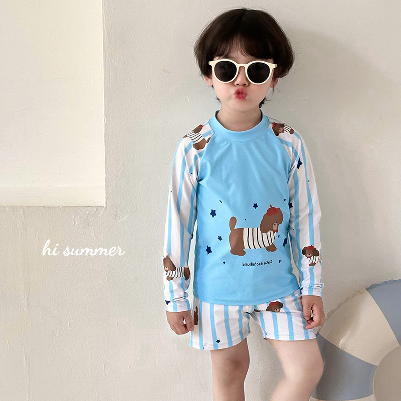 เด็กฤดูร้อนน่ารักเด็กชายการ์ตูนลูกสุนัขพิมพ์แขนยาวชุดว่ายน้ําสองชิ้น + หมวกว่ายน้ํา