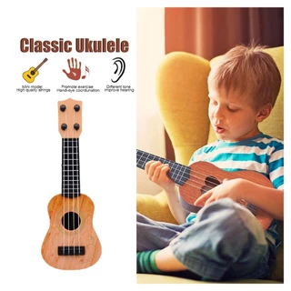 คูปองสถดคุ้ม！ กีต้าร์อูคูเลเล่ กีต้าเด็กดีดได้จริง เสียงดี Ukulele ของเล่นของขวญเด็ก