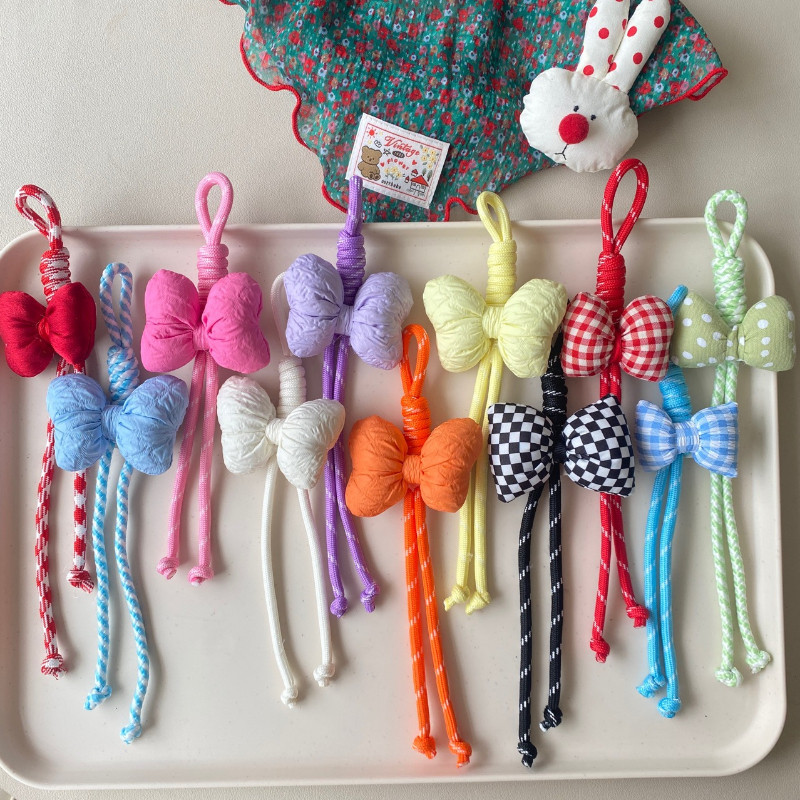 สายคล้องโทรศัพท์แฮนด์เมดสีสันสดใสพร้อมกุทัณฑ์เหมาะสําหรับอุปกรณ์กระเป๋าที่สดใหม่และมีเสน่ห์พวงกุญแจรถ