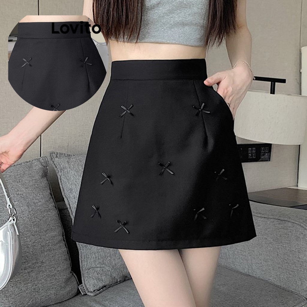 Lovito กระโปรงผู้หญิง สีพื้น แต่งโบว์ สไตล์ลำลอง LNA68205